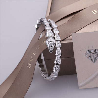 Da um-bobina romance da víbora de Itália o bracelete magro Serpenti no grupo do ouro 18K branco com os diamantes completos do pavé serpenteia a pulseira
