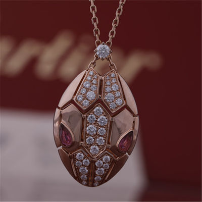 Qualidade A colar de Roman Serpenti em 18 kt aumentou ouro ajustado com olhos do rubellite e com os diamantes do pavé na cabeça fábrica