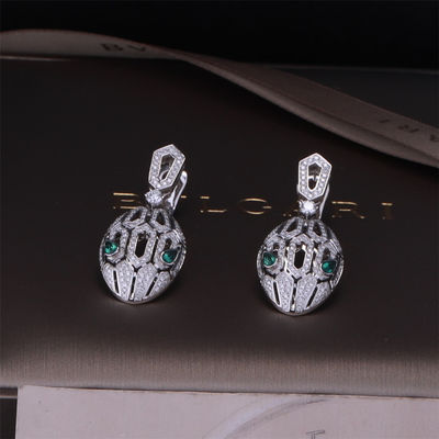Qualidade Os brincos luxuosos de Serpenti do tipo do ouro no grupo do ouro 18K branco com Emerald Eyes e com diamantes do pavé serpenteiam a cabeça fábrica
