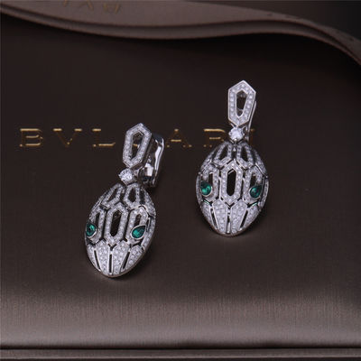 Qualidade Os brincos luxuosos de Serpenti do tipo do ouro no grupo do ouro 18K branco com Emerald Eyes e com diamantes do pavé serpenteiam a cabeça fábrica